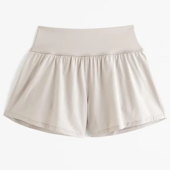 YPB Abercrombie Workout Shorts MotionTEK Hybrid Lined Flounce Shorts Sand Grey - Picture 3 of 3